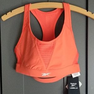 Reebok hero racer sports bra size small.